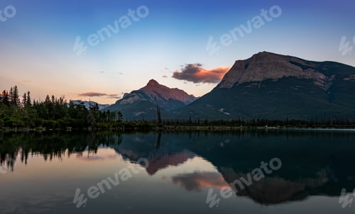 Preview: Calm Gap Lake at sunset in Alberta, Canada.