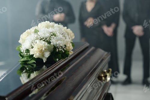 Preview: Group of Middle Aged People Mourning Beside Coffin during Funeral Ceremony