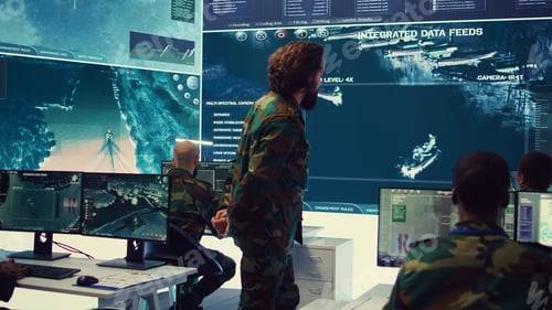 Preview: Staff sergeant briefing his army troops crew with details of a new mission