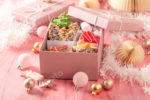 Preview: Cute Christmas gingerbread cookies with Christmas baubles and decorations..