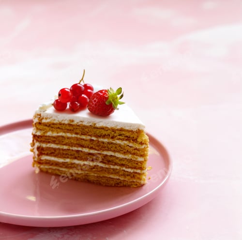 Preview: honey cake dessert on a plate on a pink background