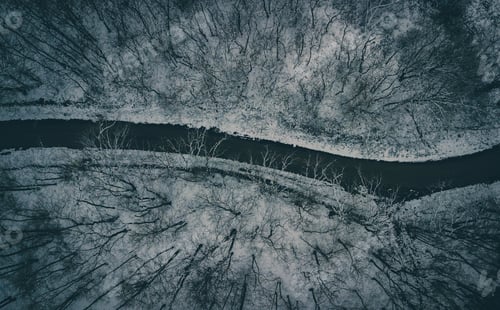 Preview: Birdseye landscape view of a frozen river during winter