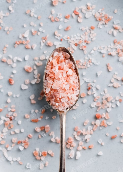 Preview: Top view of Himalayan pink salt, macro photography.