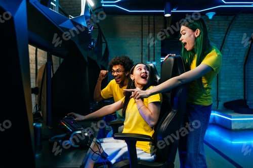 Preview: Multiethnic group of young friends playing videogames