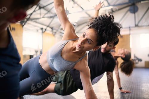 Preview: Fitness, active and healthy friends stretching, exercising or cardio training together in gym. Youn