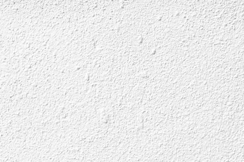 Preview: White concrete wall texture background. Uneven render stucco white painted concrete wall.