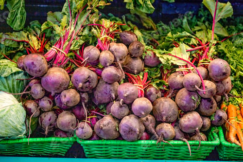 Preview: Fresh picket beets and vegetables in baskets at a farm stand