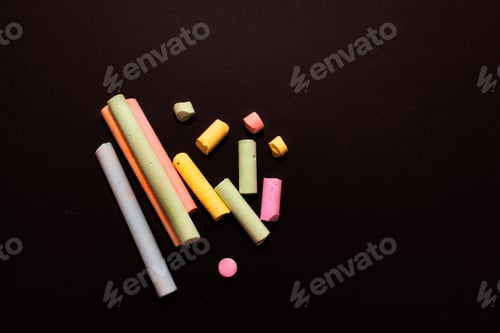 Preview: Black chalk board background with colored chalks