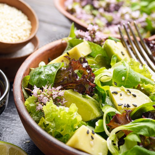 Preview: Clay dish with salad of avocado, green and violet lettuce, lamb'