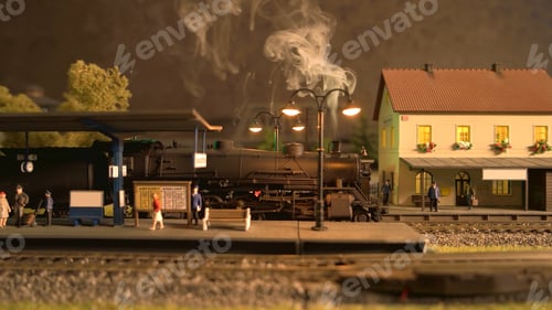 Preview: The old steam locomotive on model train station.
