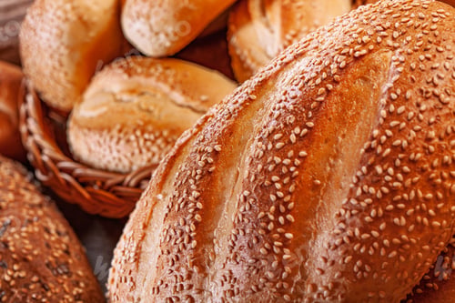 Preview: Fresh baked bread. Assorted bakery products loafs of bread and rolls...