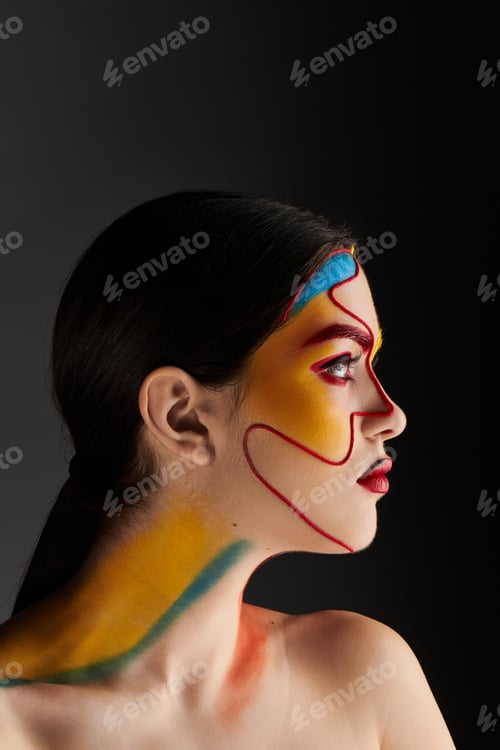 Preview: Young beautiful woman showcases vibrant face art with bold colors in a stylish setting