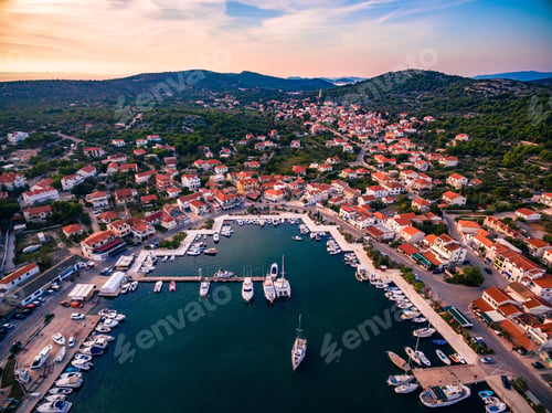 Preview: Aerial drone view of small marina with boats and yachts docked in Croatia