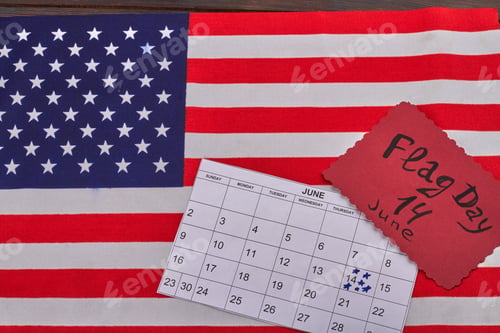 Preview: Fabric United States flag with calendar with marked 14 june day.