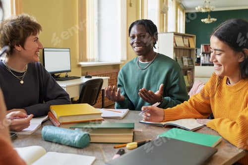 Preview: Collaborative Students Sitting in Classroom Learning Together