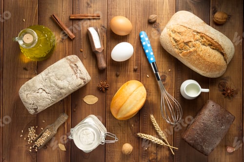 Preview: bread and bakery ingredients on wood