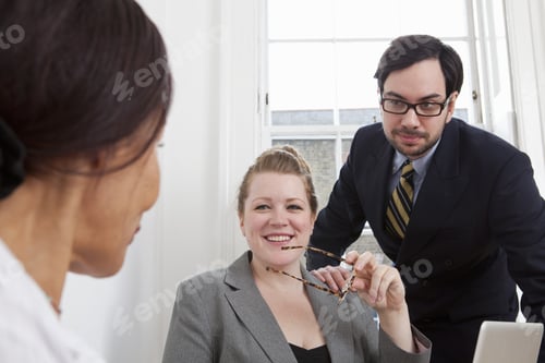 Preview: Business people working in office