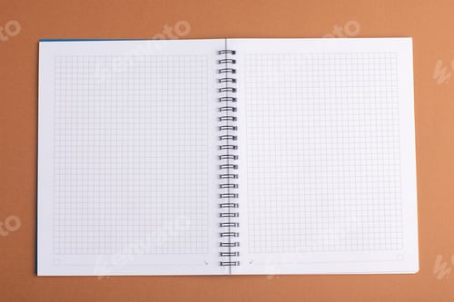 Preview: top view open copybook on brown background school notepad copybook