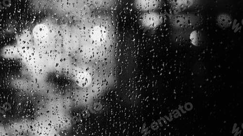 Preview: Window and rain drop in condominium or apartment room on a rainy day