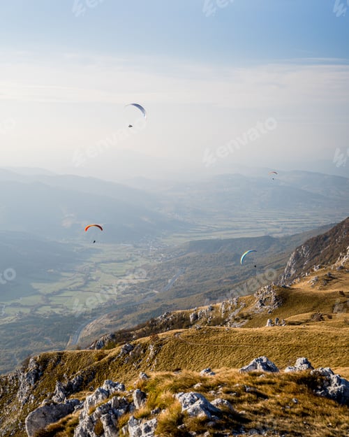 Preview: Beautiful view of Paragliding pilots over Vipava valley, Slovenia
