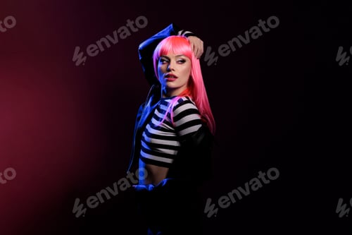 Preview: Portrait of sexy funky rocker posing in dark shadows