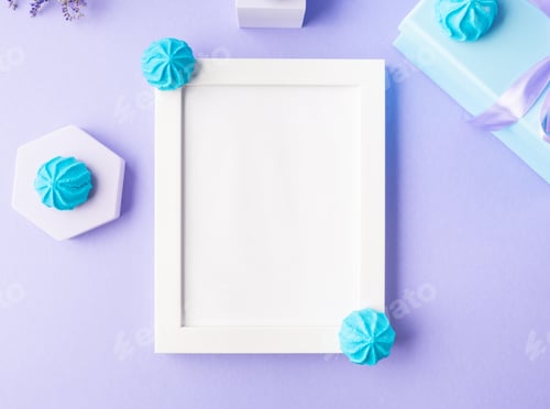 Preview: White empty frame on purple background with blue sweet decor