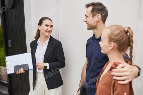 Preview: Real Estate Agent Meeting Clients Outdoors