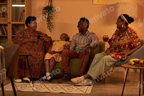 Preview: Black Family Celebrating Kwanzaa at Home