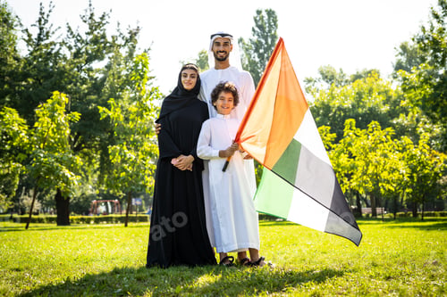 Preview: cinematic image of a family from the emirates spending time at the park