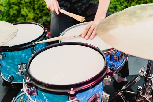 Preview: set of drums being played by drummer