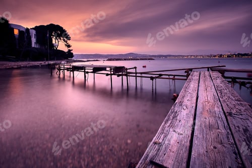 Preview: Old pier at the coast of the French Riviera during sunset