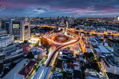 Preview: Cityscape of Victory Monument with car traffic on roundabout road at Bangkok, Thailand