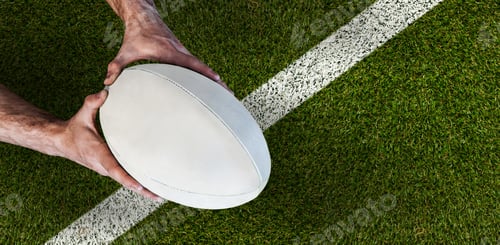 Preview: Composite image of man holding rugby ball