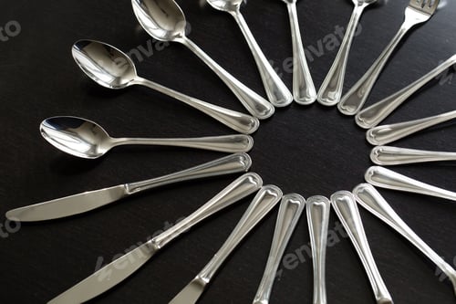 Preview: Cutlery on a black background. Fork, spoon, knife.