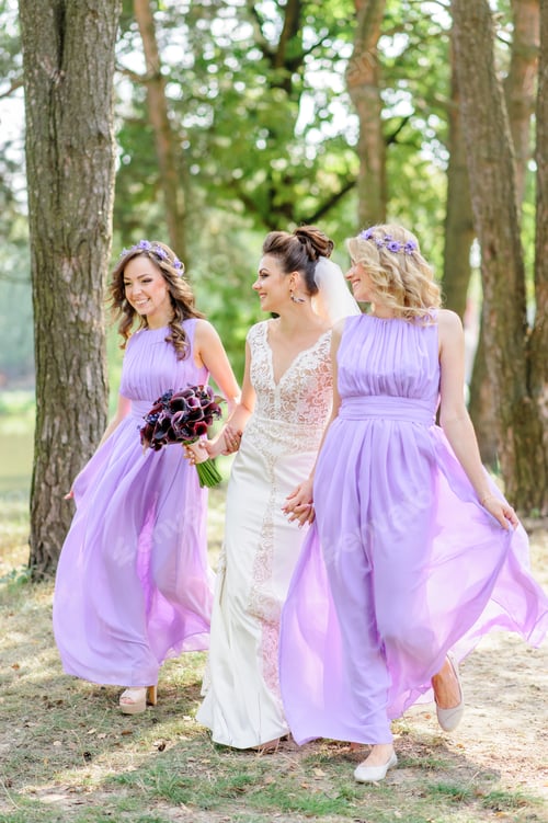 Preview: The bride and her girlfriends have fun outside.