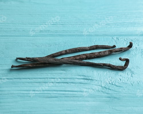 Preview: Bunch of vanilla sticks on wooden background