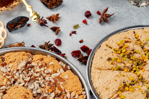 Preview: Turkish pastries and scattered dry fruits on table
