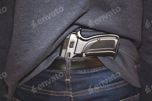 Preview: Handgun under belt