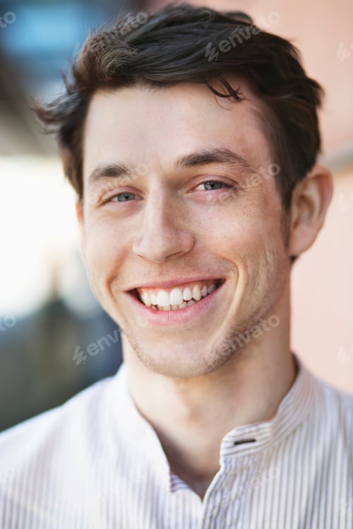 Preview: Portrait of happy handsome man