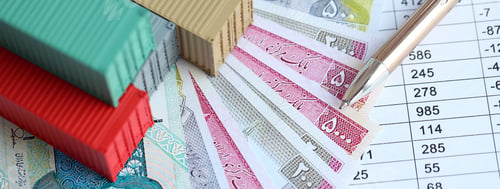 Preview: Company shipping cargo containers in Iran with rials money bills and pen