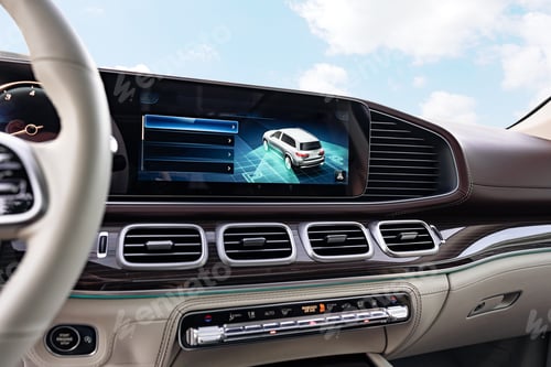 Preview: Modern luxury car interior with steering wheel, multimedia and dashboard