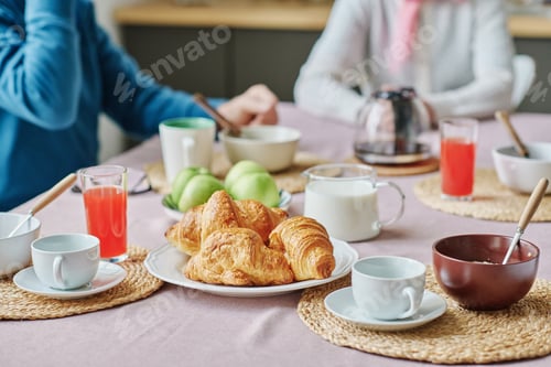 Preview: Senior people having breakfast at table