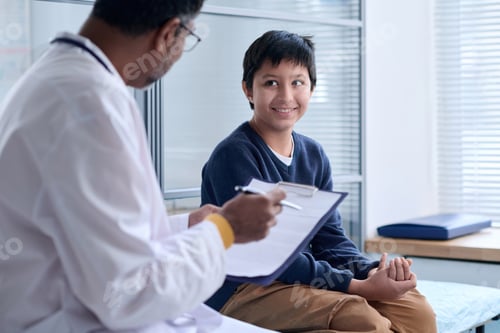 Preview: Smiling Boy Looking at Doctor