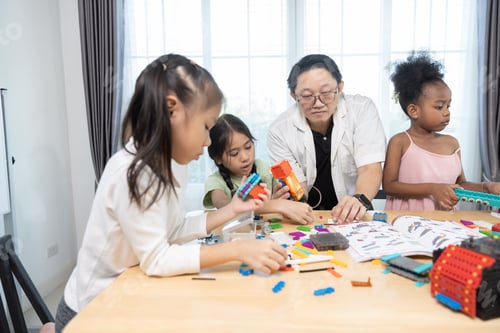 Preview: Education STEM children student girl classroom in school. Robot assembly training, brain development
