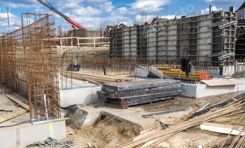 Preview: Construction Site With Foundation Work Underway in an Urban Area