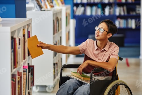 Preview: Student with Disability Choosing Books in Library