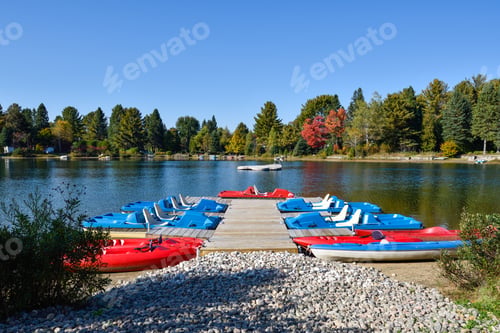 Preview: Kayaks Pedalos on lake side docks Laurentian Canada