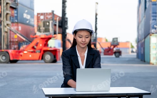 Preview: Portrait of engineer worker of factory technician with Chinese woman style sit and work