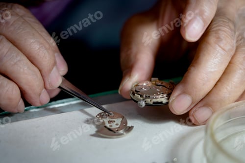 Preview: Watchmaker is repairing the mechanical watches in his workshop