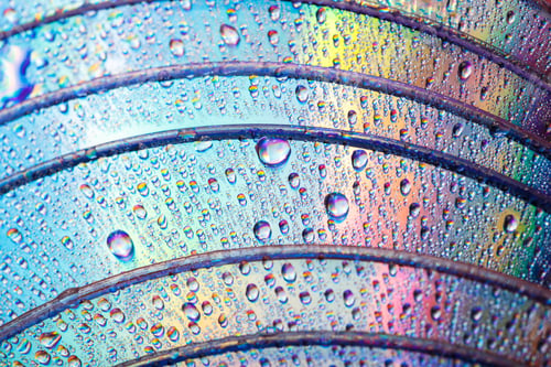 Preview: Colorful, Rainbow, Abstract Background. Water Drops. Condensate. Texture Of Glass. Parallel Lines